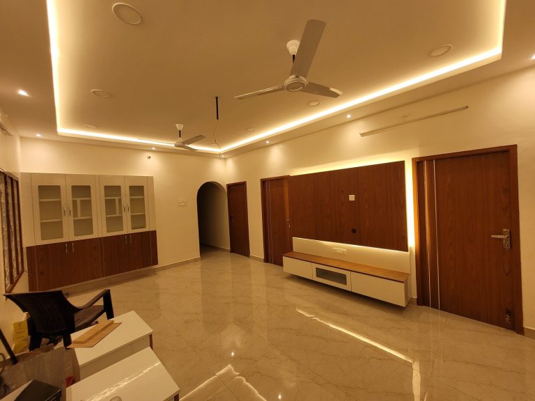 golden and brown themed bedroom interior design done at guindy chennai