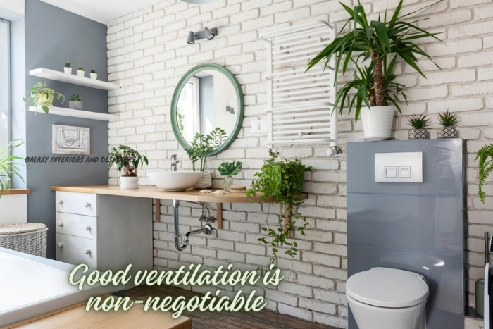 Stylish and airy bathroom design with ample greenery and natural light by Galaxy Interior Designers, illustrating the importance of good ventilation in Chennai homes