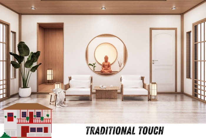 Chennai's Galaxy Interior Designers blend traditional touch with modern design. This serene living space features minimalist furniture, a Buddha statue for a peaceful ambiance, and lush indoor plants. Perfect for Chennai homes seeking a balance of tradition and contemporary style