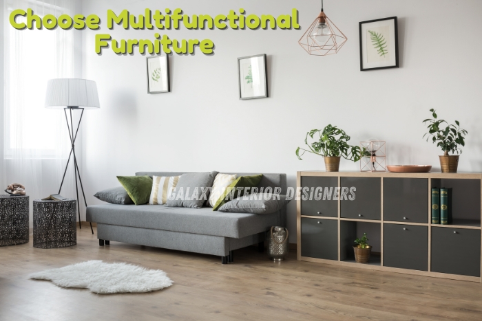 Multifunctional furniture design by Galaxy Interior Designers in Chennai, featuring a modern living room with space-saving storage and Interior Decorators